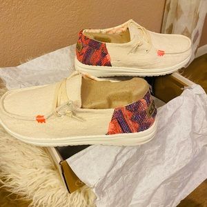 Hey Dudes, women’s size 7. Funky Boho. Like new with box. Only worn twice.